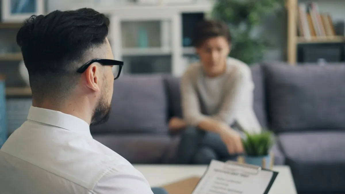 Therapist in session with a client